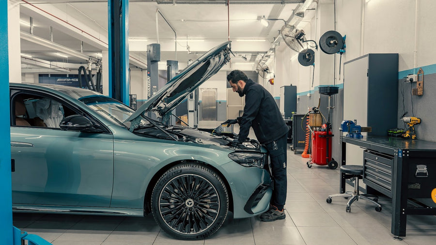 Bright clean automotive workshop with organized tools and controlled work space